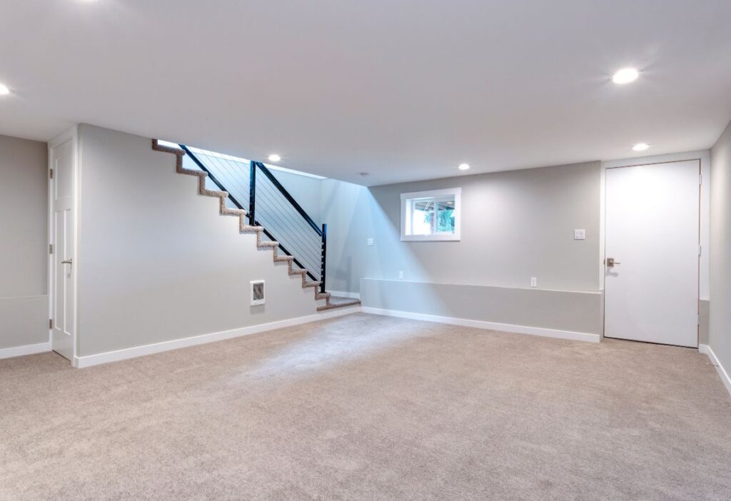 a room with stairs and a door