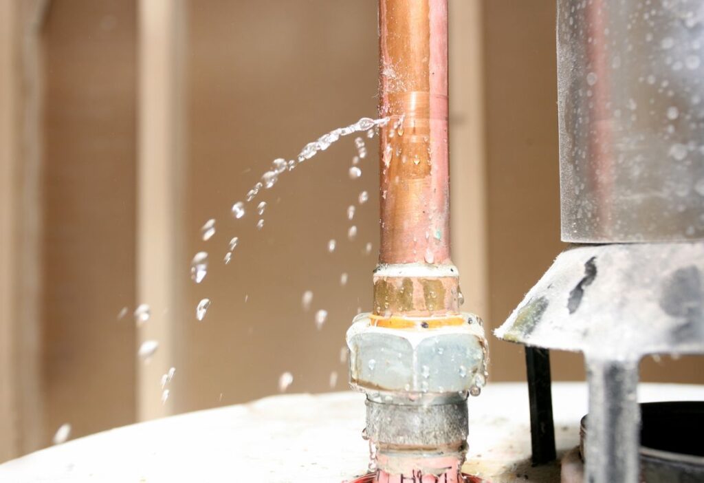 Basement Mold Prevention in Orange County, Ca | Top 5 Tips & Tricks 1 water dripping water from a pipe