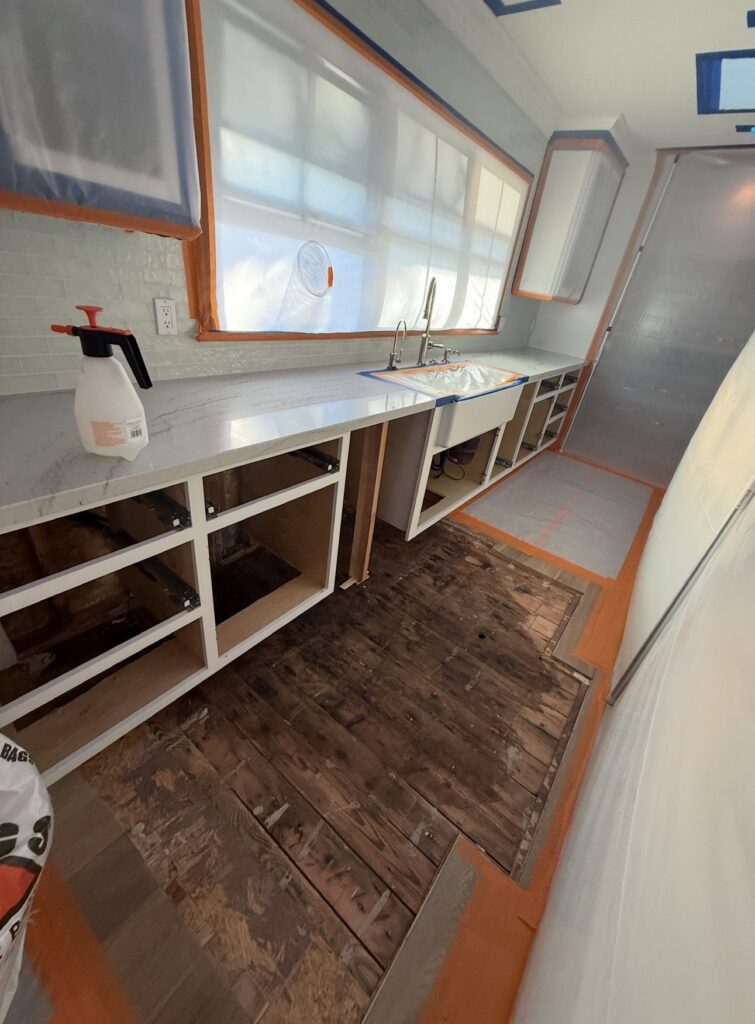 Musty Smell but No Visible Mold? Where Mold May Be Hiding 2 Kitchen mold remediation after hidden water damage was discovered
